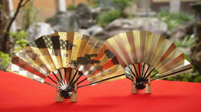 Folding Fans: Cooling Accessories Encapsulate Elegance