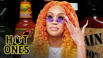 Saweetie Almost Tap Tap Taps Out While Eating Spicy Wings