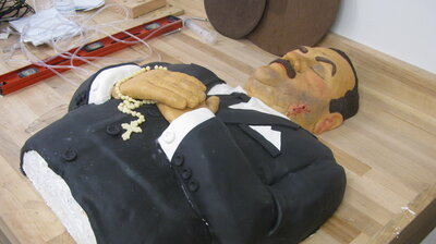 Coffins, Costumes and a Cake on a Gurney