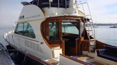 L.S.A. Bluenose II restoration, Hinckley Talaria Flybridge, Stardust Cruisers custom houseboat