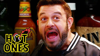 Adam Richman Fanboys Out While Eating Spicy Wings