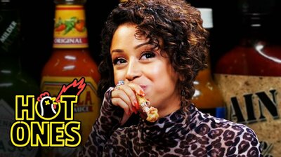 Liza Koshy Meets Her Future Self While Eating Spicy Wings
