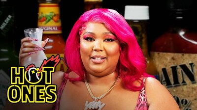 Lizzo Earns Her Hot Sauce Crown While Eating Spicy Wings
