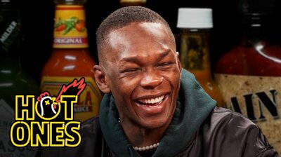 Israel Adesanya Gives Thanks While Eating Spicy Wings