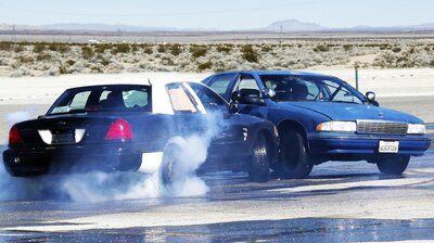 Chevy vs. Ford Cop-Car Thrash Battle!