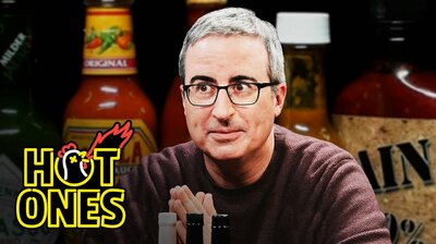 John Oliver Fears For Humanity While Eating Spicy Wings