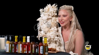 Lady Gaga Tries to Keep a Poker Face While Eating Spicy Wings