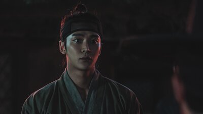THREE. A STRONG NEW MAN