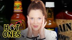Drew Barrymore Has a Hard Time Processing While Eating Hot Wings