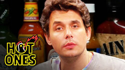 John Mayer Has a Sing-Off While Eating Spicy Wings