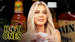 Khloé Kardashian Holds Back Tears While Eating Spicy Wings