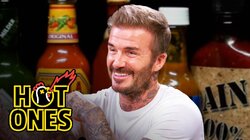 David Beckham Embraces the Moment While Eating Spicy Wings