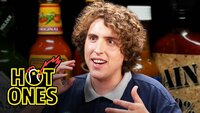 Andrew Callaghan Goes For the Marrow While Eating Spicy Wings