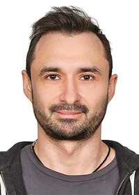 Олег Спигин